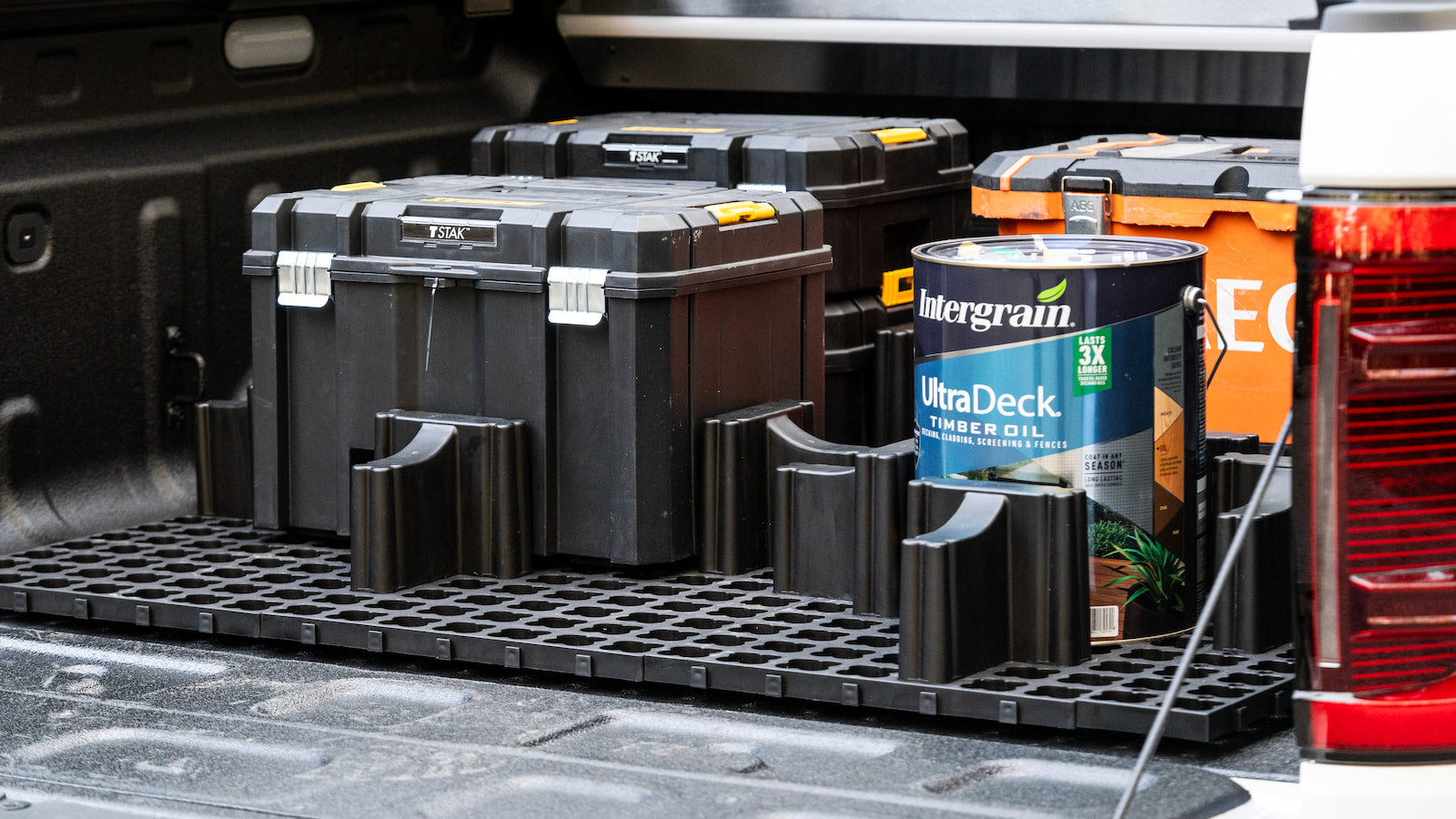 LockNMat ute tray mat with toolbox and work gear in a ute tray